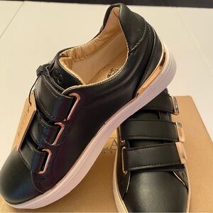 Fun Black Sneakers with Gold accents